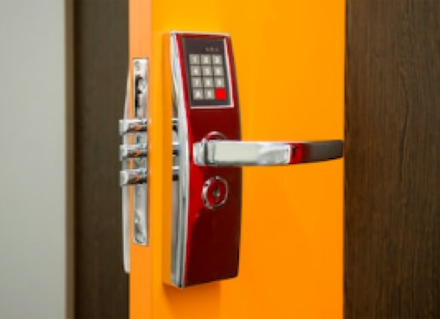 Keypad lock and mortise hardware on a commercial door